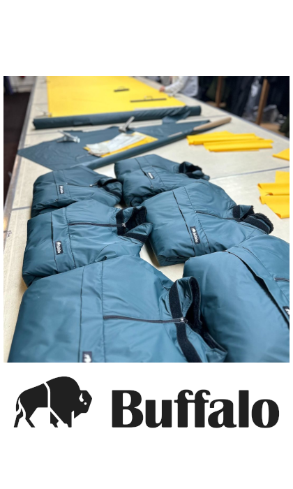 A table full of Buffalo Systems Ltd clothing.