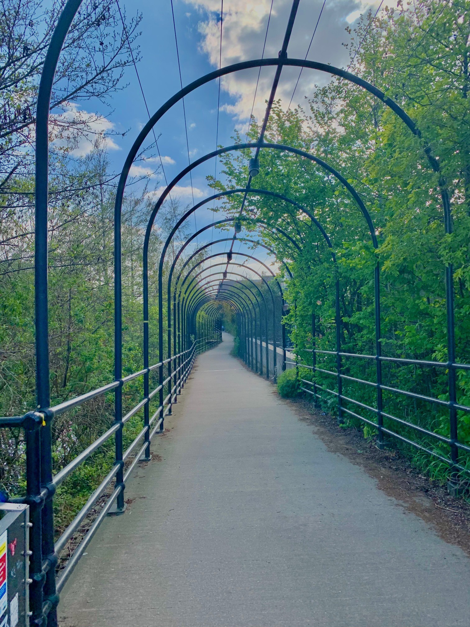 Five Weirs Walk bridge on a sunny day.