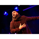 A person performing on a stage.