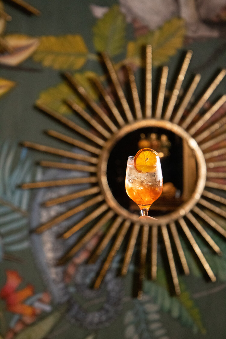 A cocktail in a picture frame.