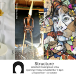 Promotional graphic for Structure, a selected mixed group exhibition. Three artworks are shown side by side: a delicate flower-like sculpture on a curved stem displayed in a tall glass vase; a carved wooden seated figure wearing a tall pointed hat in a studio setting; and a colourful mixed-media portrait made from layered paper, text fragments and paint. Text reads: “Structure, selected mixed group show. Opening: Friday 11 September 7–9pm. 12 September – 10 October.”
