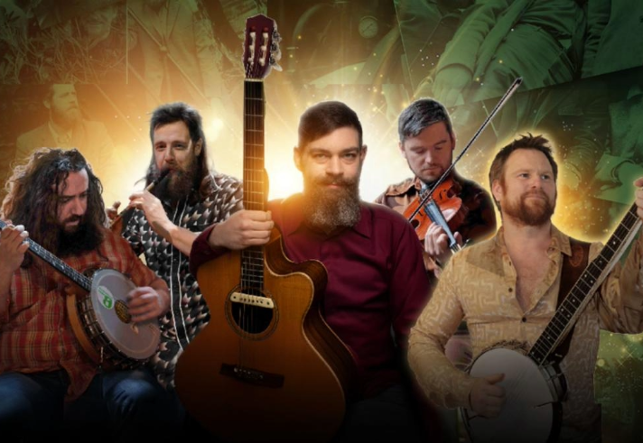 Five musicians holding instruments including two banjos, an acoustic guitar, and a violin, posed against a vibrant background with warm golden light and green tones featuring faint historical imagery.