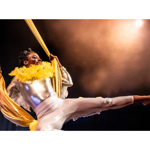 A woman performing on silk ropes.