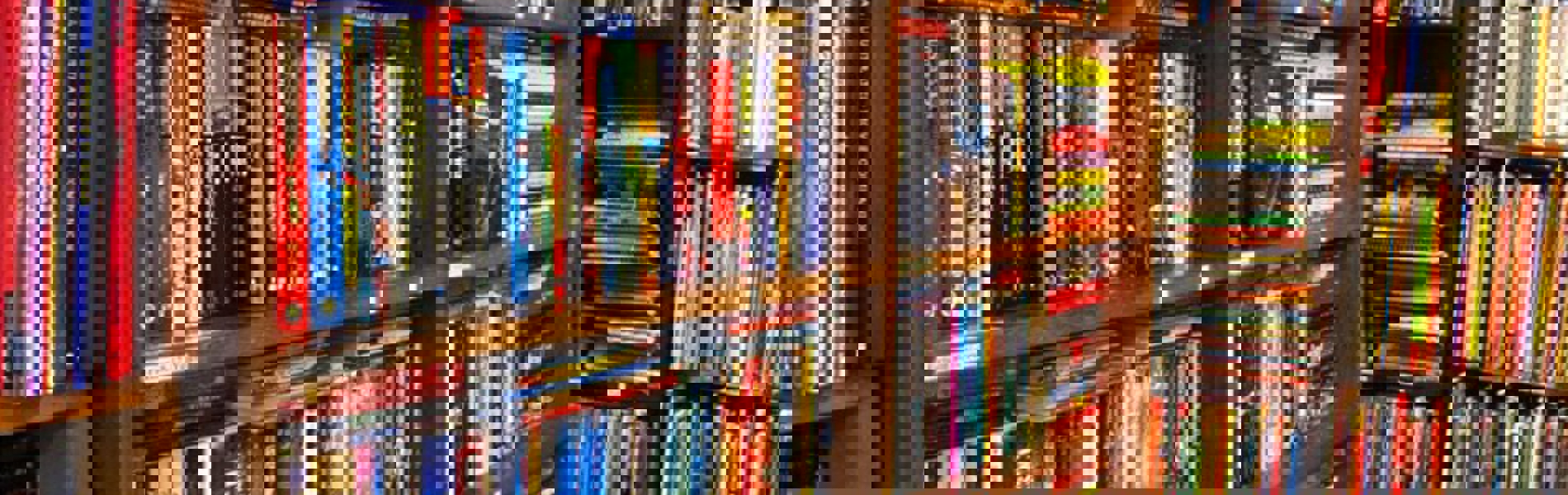 Several bookcases full of books.