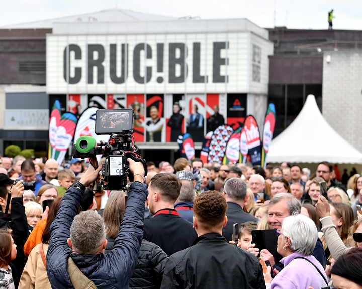 Tudor Square, in Sheffield city centre, is thronging with people, who have come to watch the snooker at The Crucible.