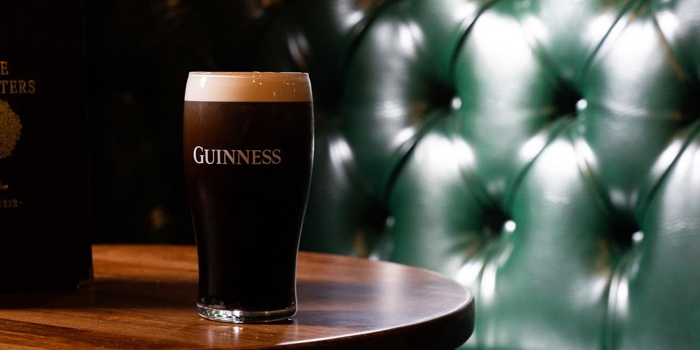 A booth and a pint of Guinness at The Foresters.