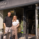 A couple standing outside Heritage Lifestyle