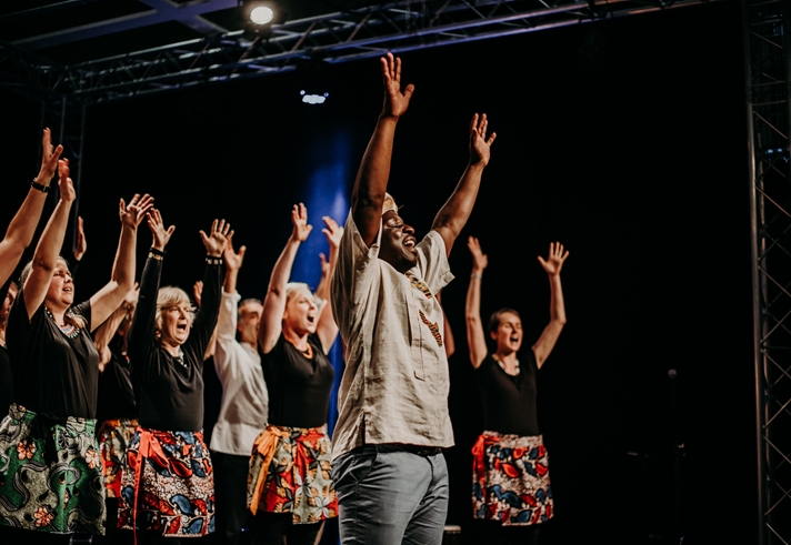 Crowds enjoy a performance at Migration Matters festival 2019