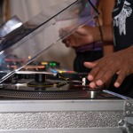 A DJ plays music.