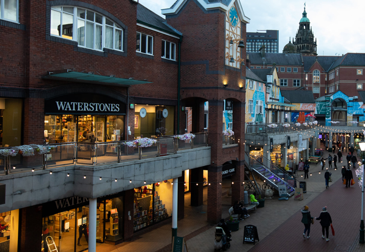 The exterior of Waterstones at dusk.