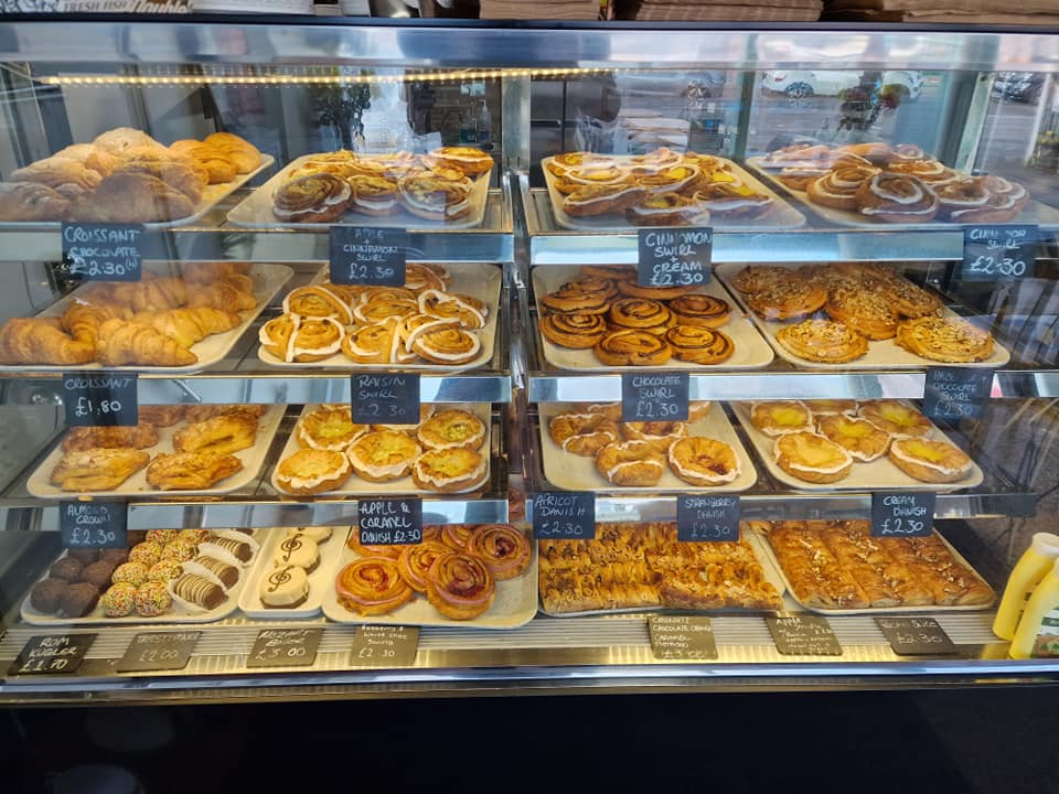 A glass case full of baked goods at Kringle Danish Bakery.