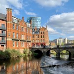 A weir on the River Don in the centre of Sheffield. In the background is Lady's Bridge.
