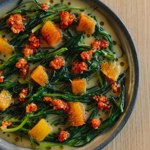 An overhead view of  a bowl of soup.