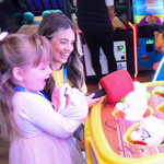People playing games and having fun at Funstation, in Meadowhall.