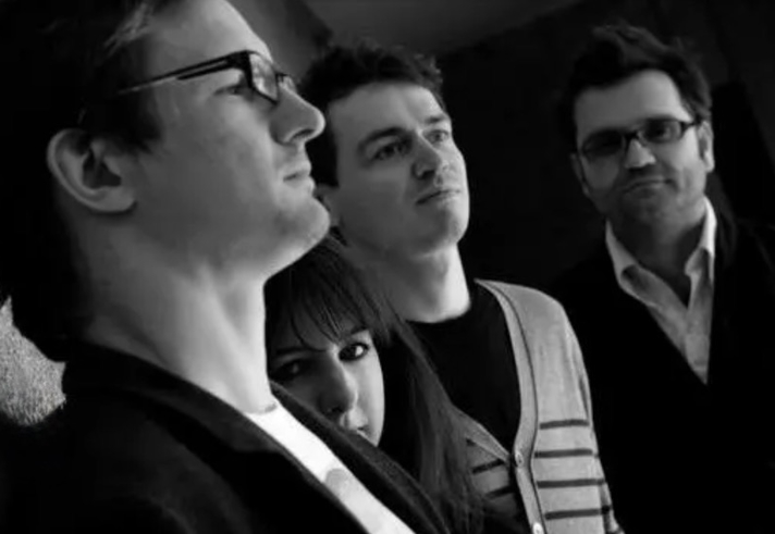 Black and white photo if the band David Cronenberg’s Wife.