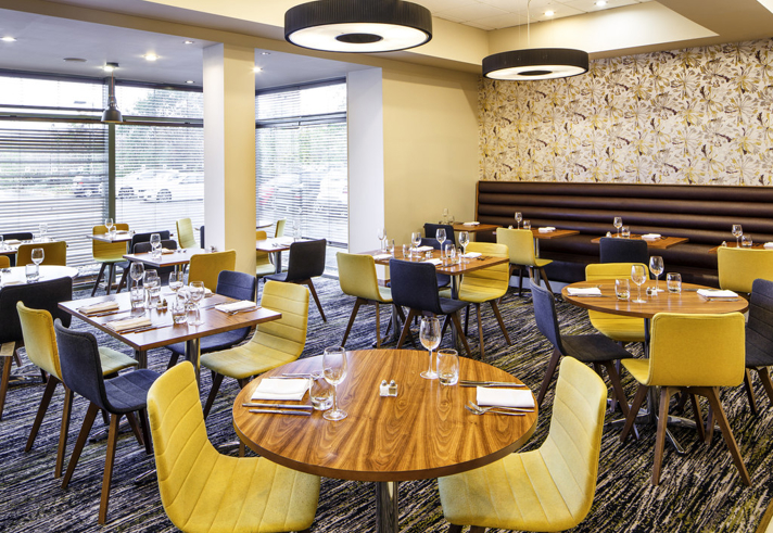 Stylish bar area at Mercure Sheffield Parkway Hotel with seating and ambient lighting