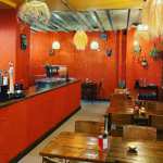 The bar and several tables at Pellizco 