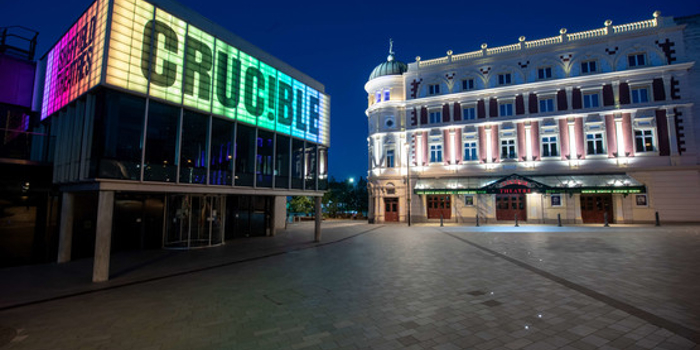 The Crucibleand Lyceum Theatres at night.