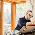 Pete Mckee at work on an easel. 