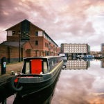 Canal boats moored at Victoria Quays in Sheffield city centre.