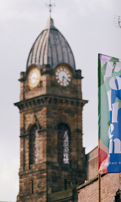 A Pollen Market flag flutters in the breeze.