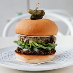 A burger on a plate.