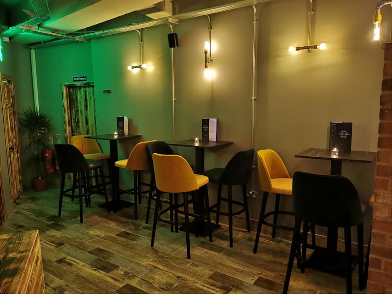 Tables and chairs at Boulevardier