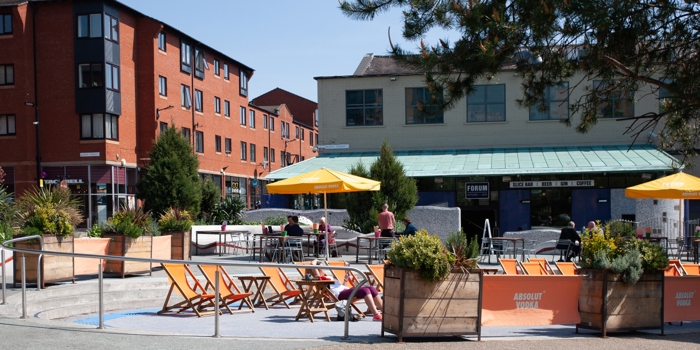 Seating area outside the Forum Kitchen + Bar.