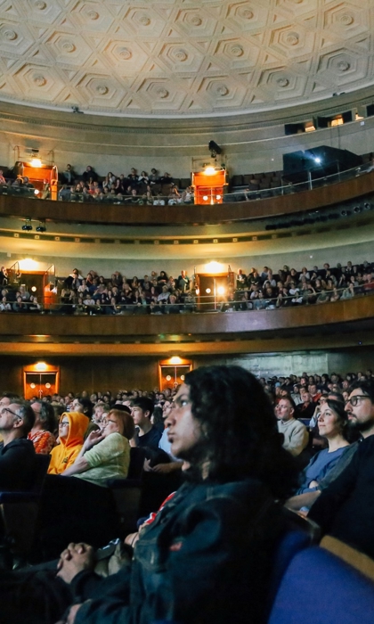 An audience inside the Oval Hall at The City Hall in Sheffield.
