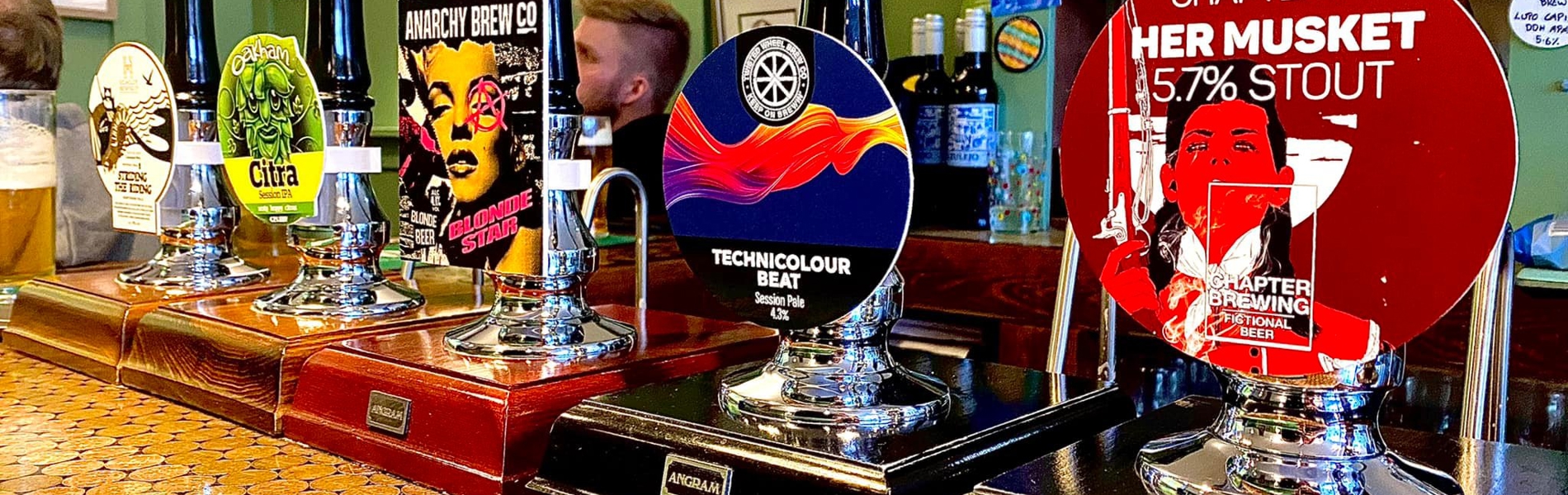 Beer pumps at The Itchy Pig.