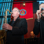 A big band performing in a bar.