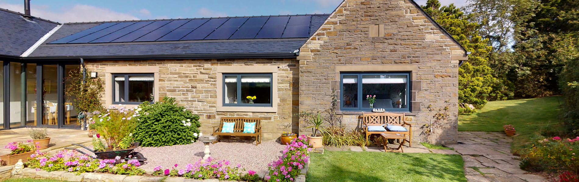 Exterior view of Finkle Green Bed and Breakfast with entrance and surrounding greenery