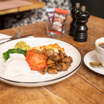 An English breakfast and a cup of coffee.