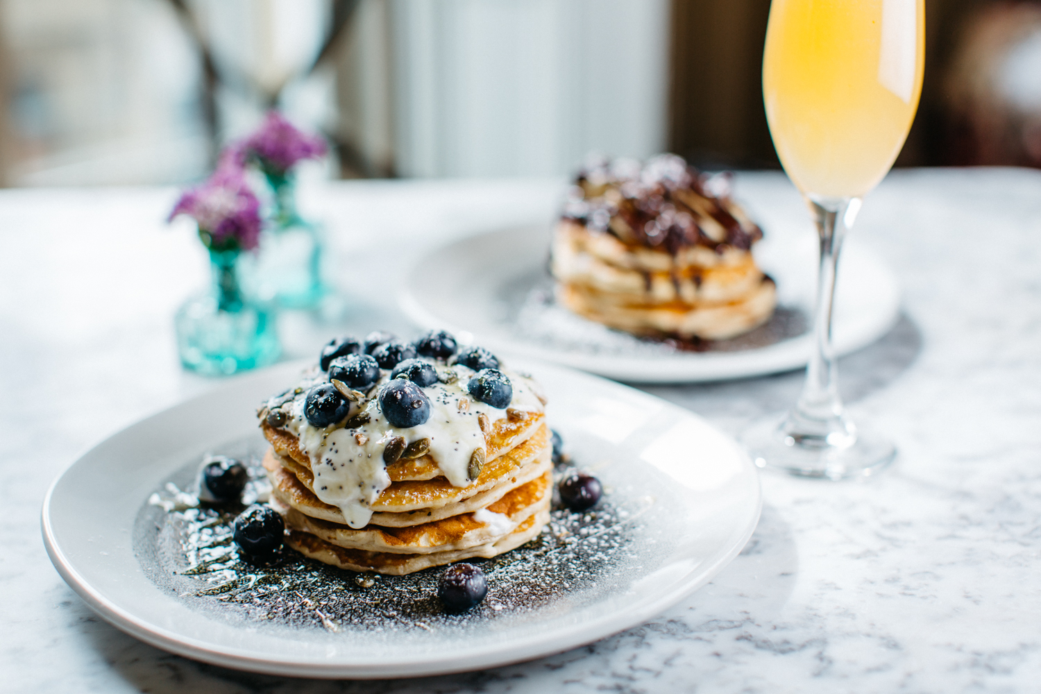 A stack of blueberry pancakes.
