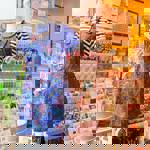 A mannequin wearing a blue paisley dress at Mookau. 