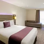 Premier Inn Sheffield Arena – double room with signature purple decor.