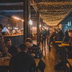 Inside Cutlery Works, filled with customers dining.