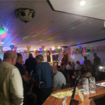 The Centre Spot at night filled with customers.