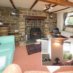Bright, welcoming living room at The Old School House with traditional furnishings and homely touches.