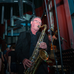 A big band performing in a bar.