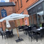 Outdoor tables at the Chop Shop Bar & Grill.