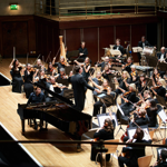 The Brigantes Orchestra performing on a stage.