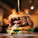 A double patty cheese burger with bacon.