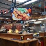 Inside Cutlery Works, filled with customers dining.