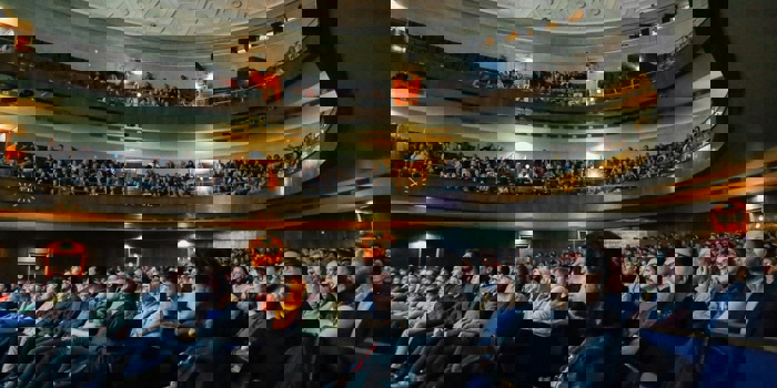 A packed-out crowd enjoys an event at the Sheffield City Hall.