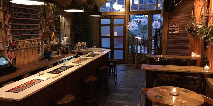 Interior of The Tramshed bar, the decor and fittings are mostly done out in reclaimed wood.