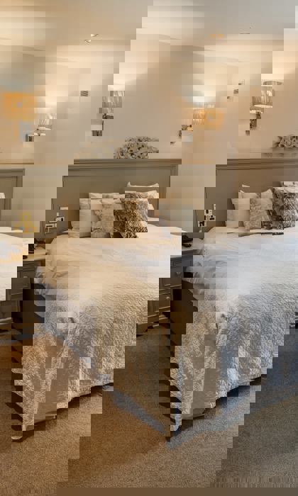 Bright and cosy guest room featuring a double bed at Losehill Hall Hotel.