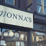 The sign on the exterior of Nonnas Restaurant.