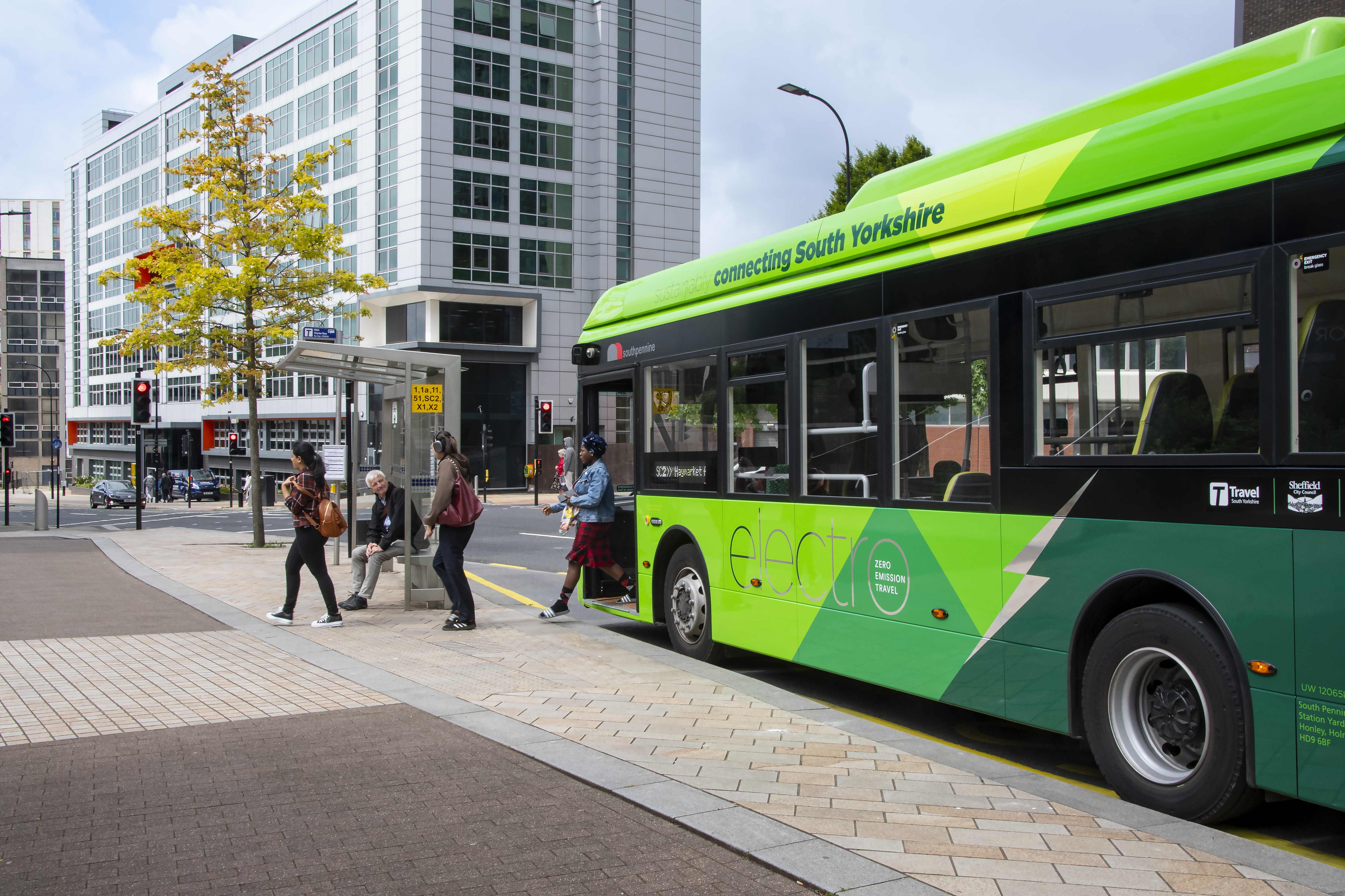 Shot showing passengers getting off the Sheffield Connect bus on Furnival Gate in the city centre