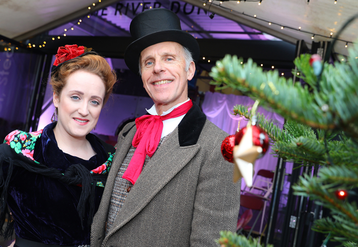 People dressed in Victorian attire at the Kelham Island Museum festive market 